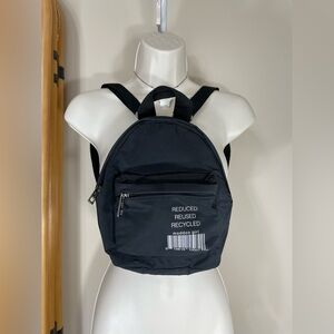 like new mini Madden Girl Black Backpack ( reduce reuse recycle) logo